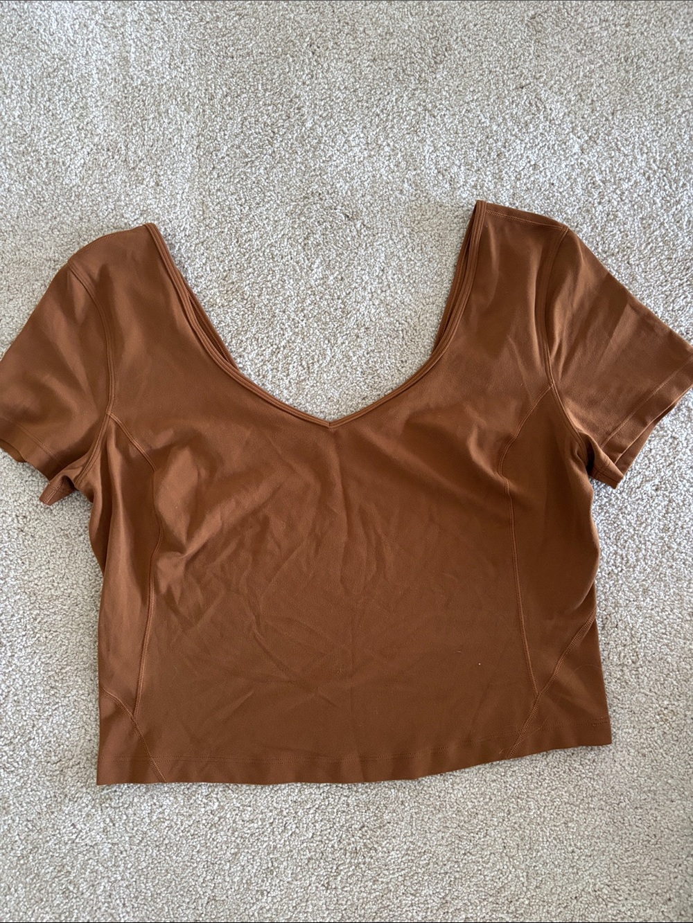 Lululemon cropped short sleeved v neck top. Size 14. Copper brown color.